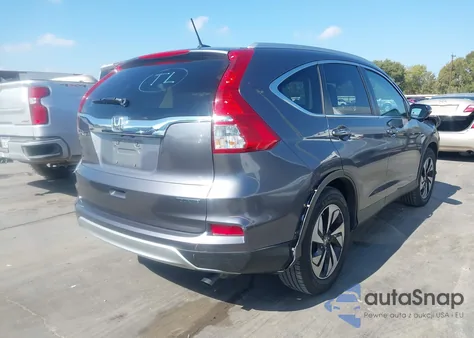 2016 Honda Cr-V Touring z USA, uszkodzony, nr VIN 5J6RM3H95GL025401